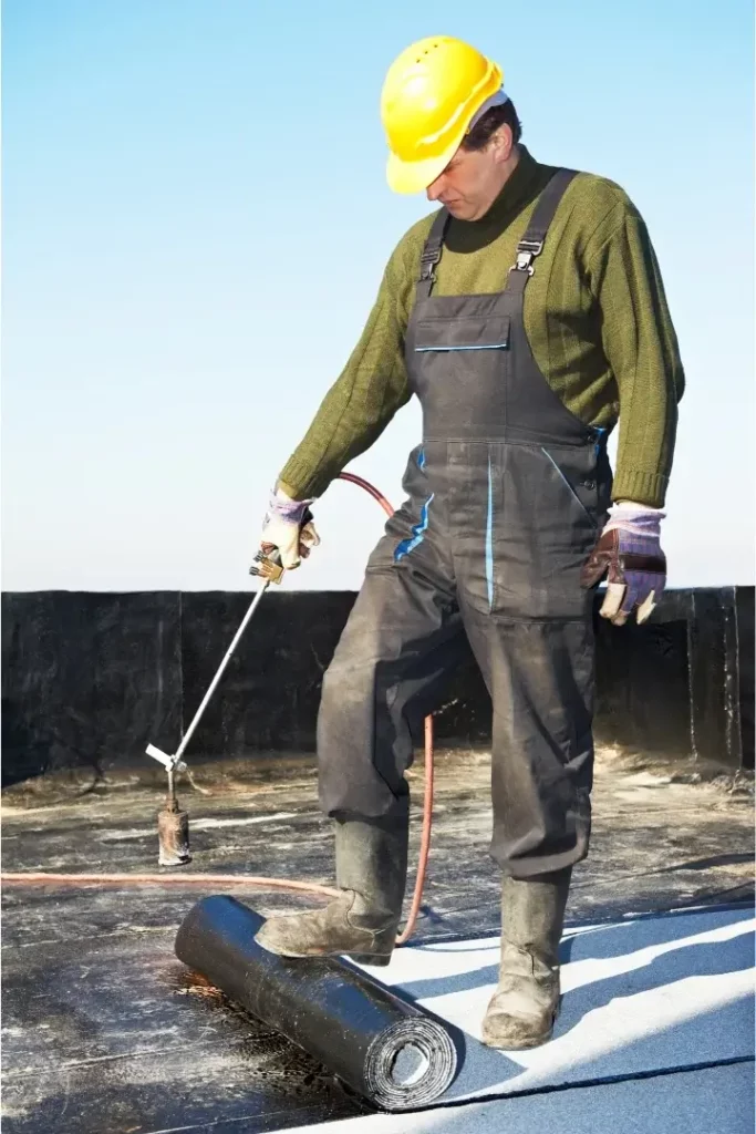 Flat roofing worker